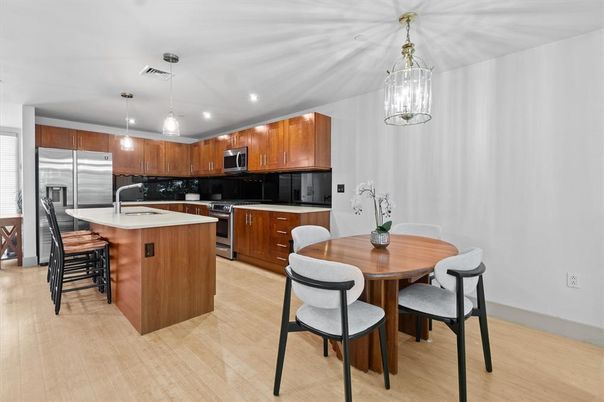 Dining room, Interior, Kitchen, Pendant Lights, Recessed Lighting, Stainless Steel Appliances, Wood Texture Flooring