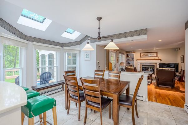 Dining room, Fireplace, Interior, Living room, Pendant Lights, Recessed Lighting, Wood Texture Flooring