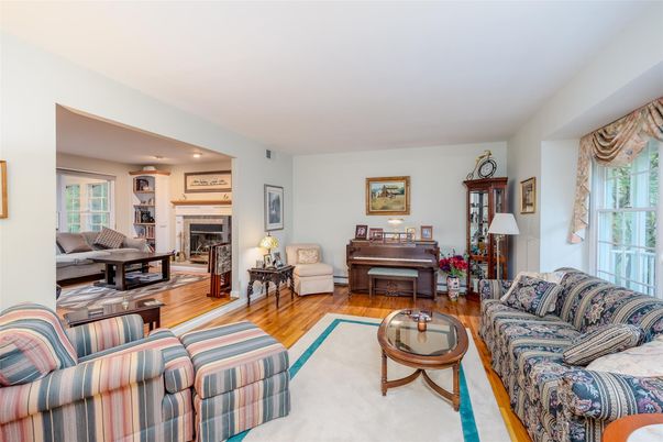 Fireplace, Interior, Living room, Piano, Recessed Lighting, Wood Texture Flooring