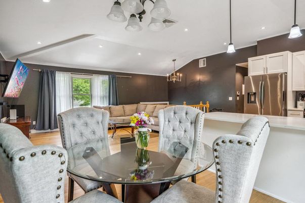 Dining room, Interior, Kitchen, Living room, Pendant Lights, Recessed Lighting, Stainless Steel Appliances, Wood Texture Flooring