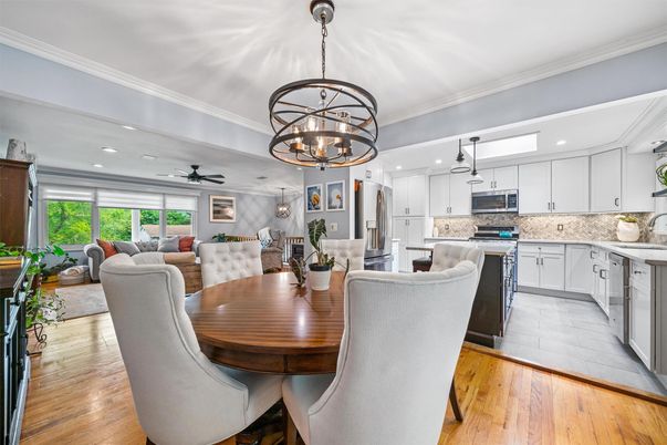 Chandelier, Dining room, Interior, Kitchen, Living room, Recessed Lighting, Stainless Steel Appliances, Wood Texture Flooring