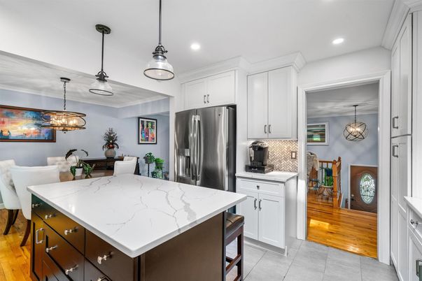 Chandelier, Dining room, Interior, Kitchen, Pendant Lights, Recessed Lighting, Stainless Steel Appliances, Wood Texture Flooring