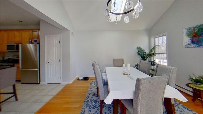 Chandelier, Dining room, Interior, Kitchen, Stainless Steel Appliances, Wood Texture Flooring