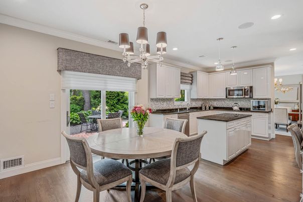 Chandelier, Dining room, Interior, Kitchen, Pendant Lights, Recessed Lighting, Stainless Steel Appliances, Wood Texture Flooring