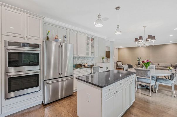 Chandelier, Dining room, Interior, Kitchen, Pendant Lights, Recessed Lighting, Stainless Steel Appliances, Wood Texture Flooring
