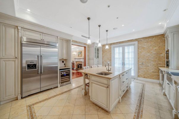 Fireplace, Interior, Kitchen, Pendant Lights, Recessed Lighting, Stainless Steel Appliances, Stone Walls