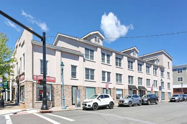 Exterior, Facade, Brick Facade, Condo Building