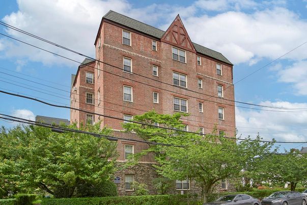 Exterior, Facade, Brick Facade, Condo Building