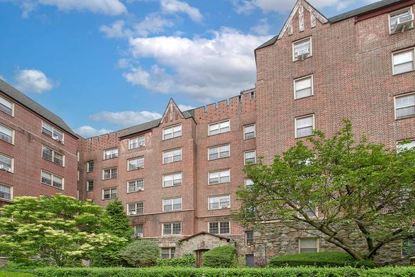 Exterior, Facade, Brick Facade, Condo Building