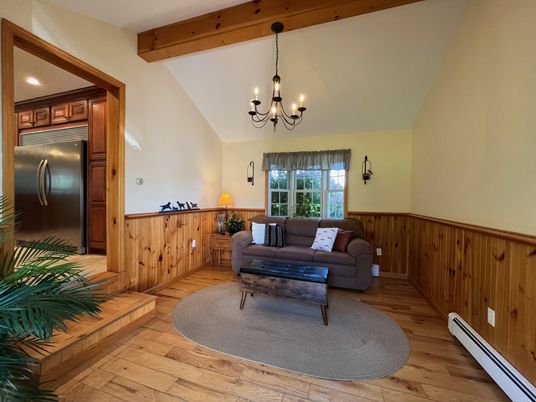Chandelier, Interior, Living room, Recessed Lighting, Stainless Steel Appliances, Wooden Beams, Wood Texture Flooring