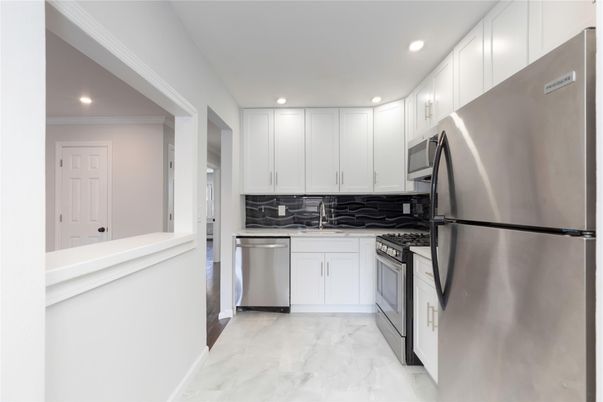 Interior, Kitchen, Marble, Recessed Lighting, Stainless Steel Appliances