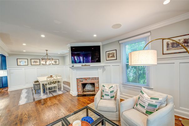 Dining room, Fireplace, Interior, Living room, Pendant Lights, Recessed Lighting, Wood Texture Flooring