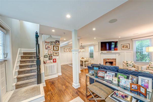 Dining room, Fireplace, Interior, Living room, Pendant Lights, Recessed Lighting, Wood Texture Flooring