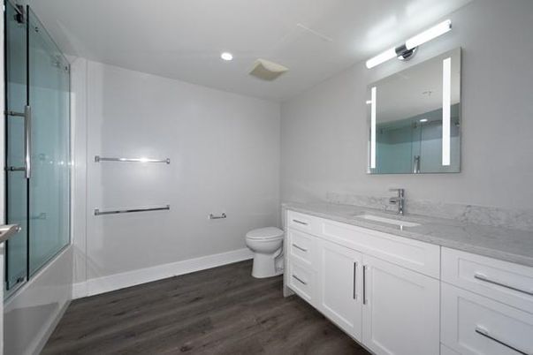 Bathroom, Glass Shower, Interior, Recessed Lighting, Wood Texture Flooring