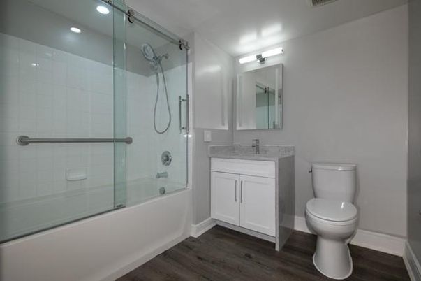 Bathroom, Glass Shower, Interior, Recessed Lighting, Wood Texture Flooring