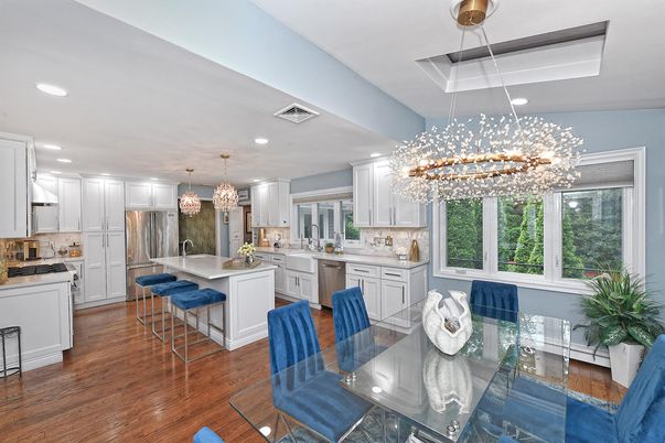 Chandelier, Dining room, Interior, Kitchen, Pendant Lights, Recessed Lighting, Stainless Steel Appliances, Wood Texture Flooring