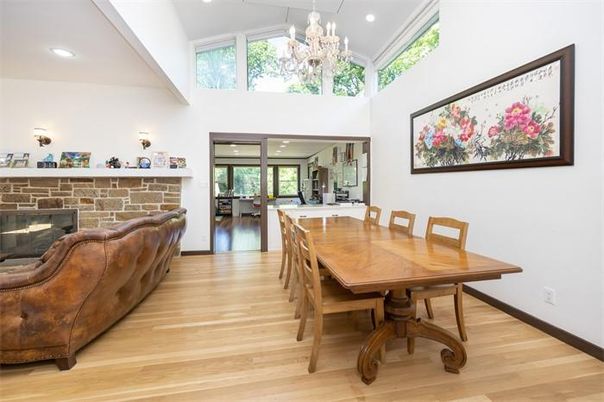Chandelier, Dining room, Fireplace, Interior, Recessed Lighting, Stone Walls, Wood Texture Flooring