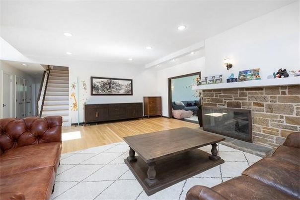 Fireplace, Interior, Living room, Recessed Lighting, Stone Walls, Wood Texture Flooring