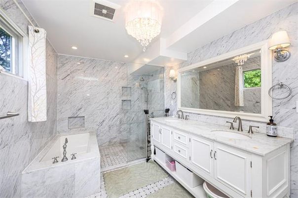 Bathroom, Chandelier, Dual Sink Vanities, Glass Shower, Interior, Marble, Marble Walls, Recessed Lighting