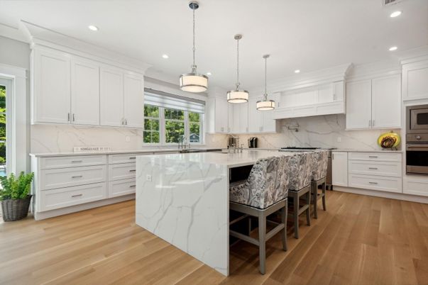 Interior, Kitchen, Marble Walls, Pendant Lights, Recessed Lighting, Wood Texture Flooring