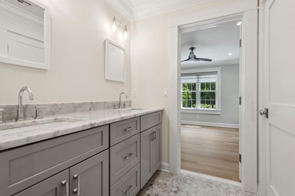 Bathroom, Dual Sink Vanities, Interior, Recessed Lighting, Wood Texture Flooring
