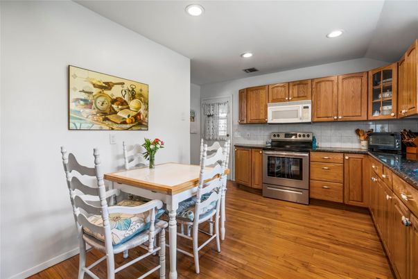 Dining room, Interior, Kitchen, Recessed Lighting, Stainless Steel Appliances, Wood Texture Flooring