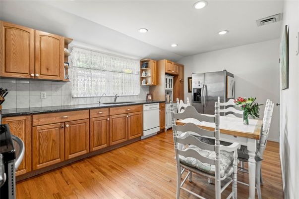 Dining room, Interior, Kitchen, Recessed Lighting, Stainless Steel Appliances, Wood Texture Flooring