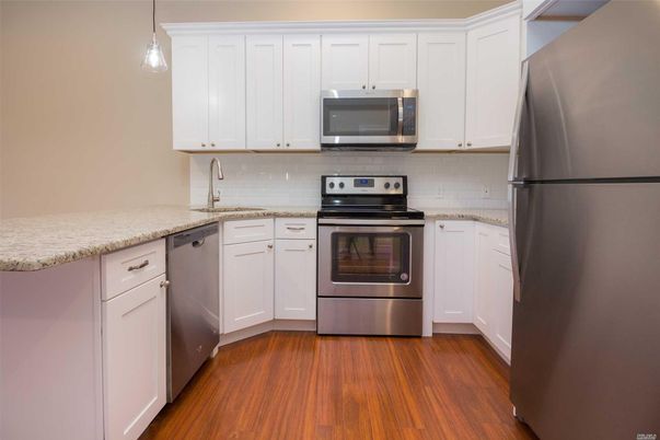 Interior, Kitchen, Pendant Lights, Stainless Steel Appliances, Wood Texture Flooring