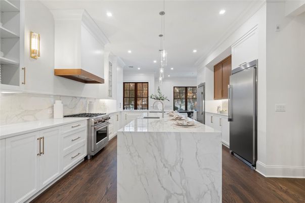 Interior, Kitchen, Marble Walls, Pendant Lights, Recessed Lighting, Stainless Steel Appliances, Wood Texture Flooring