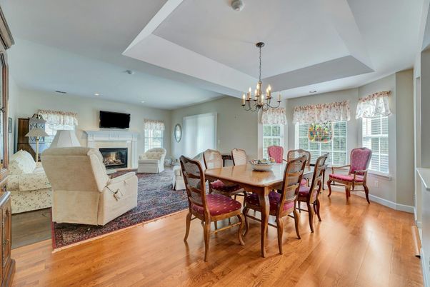 Chandelier, Dining room, Fireplace, Interior, Living room, Recessed Lighting, Wood Texture Flooring