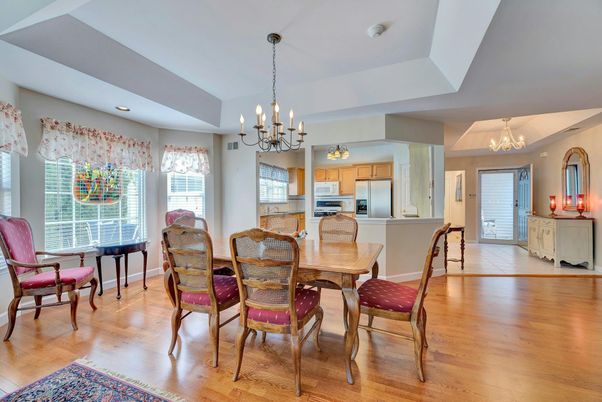Chandelier, Dining room, Interior, Kitchen, Recessed Lighting, Stainless Steel Appliances, Wood Texture Flooring