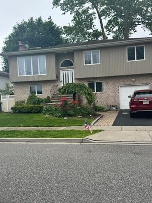 Attached, Exterior, Facade, Brick Facade, Raised Ranch