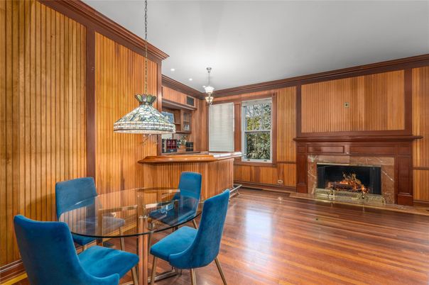 Dining room, Fireplace, Interior, Kitchen, Pendant Lights, Recessed Lighting, Wood Texture Flooring, Wooden Walls