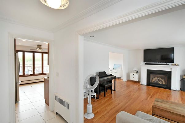 Fireplace, Interior, Piano, Recessed Lighting, Wood Texture Flooring