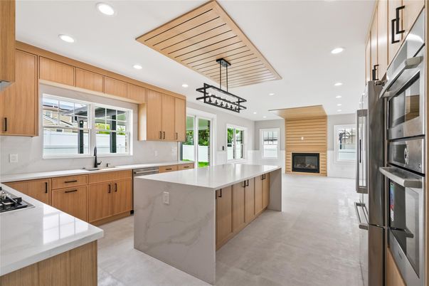 Fireplace, Interior, Kitchen, Pendant Lights, Recessed Lighting, Stainless Steel Appliances