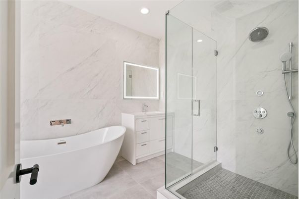 Bathroom, Free Standing Baths, Glass Shower, Interior, Marble Walls, Recessed Lighting