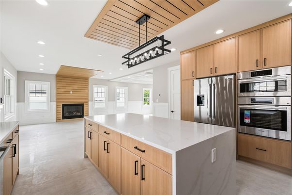 Fireplace, Interior, Kitchen, Pendant Lights, Recessed Lighting, Stainless Steel Appliances, Wooden Ceilings