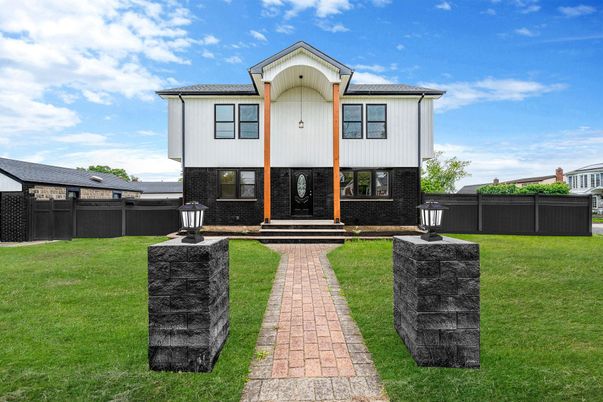 Exterior, Facade, Brick Facade, Raised Ranch
