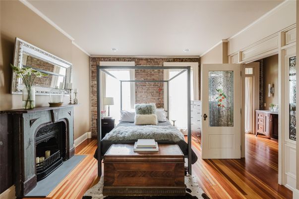 Bedroom, Fireplace, Interior, Recessed Lighting, Stone Walls, Wood Texture Flooring