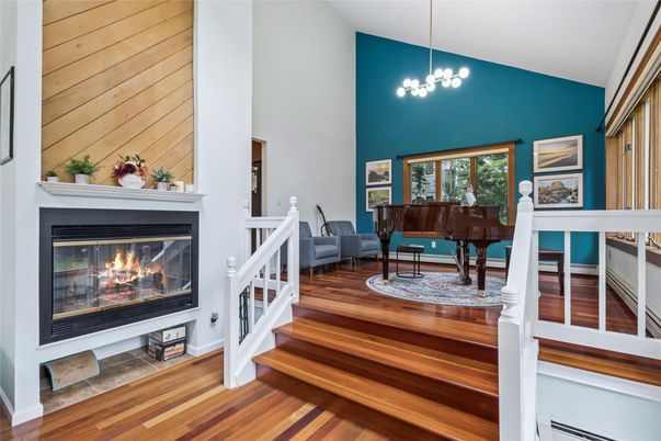 Dining room, Fireplace, Interior, Pendant Lights, Piano, Wood Texture Flooring