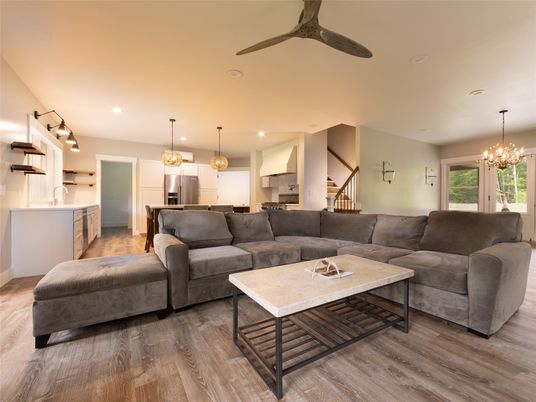 Chandelier, Interior, Kitchen, Living room, Pendant Lights, Recessed Lighting, Stainless Steel Appliances, Wood Texture Flooring