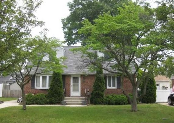Exterior, Facade, Brick Facade, Cape Cod