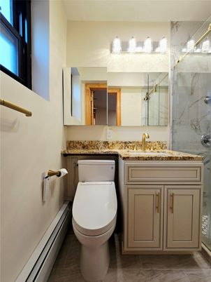 Bathroom, Dual Sink Vanities, Glass Shower, Interior, Marble Walls