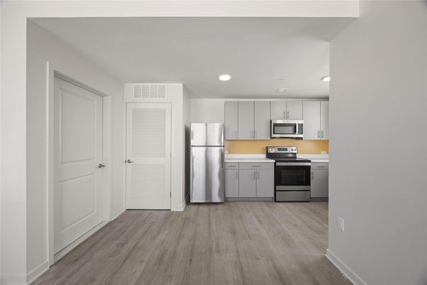 Interior, Kitchen, Recessed Lighting, Stainless Steel Appliances, Wood Texture Flooring