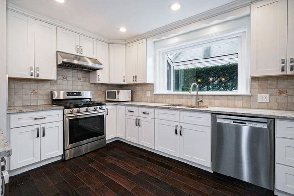Interior, Kitchen, Recessed Lighting, Stainless Steel Appliances, Wood Texture Flooring