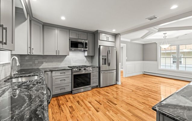 Interior, Kitchen, Pendant Lights, Recessed Lighting, Stainless Steel Appliances, Wood Texture Flooring