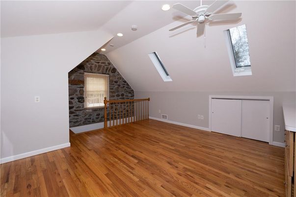 Empty room, Interior, Recessed Lighting, Stone Walls, Wood Texture Flooring