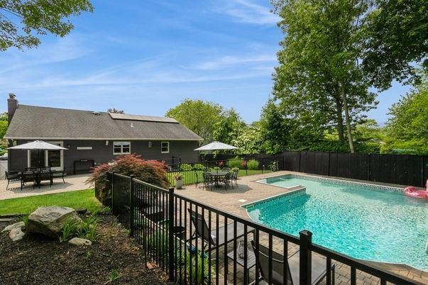 Exterior, Pool, Solar Panels