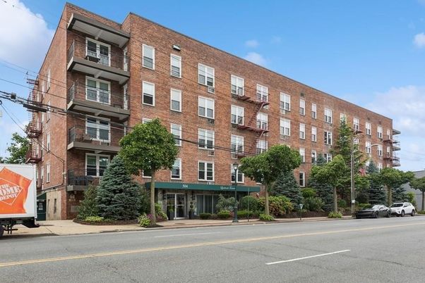 Exterior, Facade, Brick Facade, Condo Building