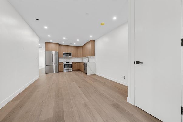 Interior, Kitchen, Recessed Lighting, Stainless Steel Appliances, Wood Texture Flooring